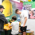 Volunteers helping JA BizTown citizens