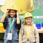 JA BizTown citizens wearing MSA hardhats